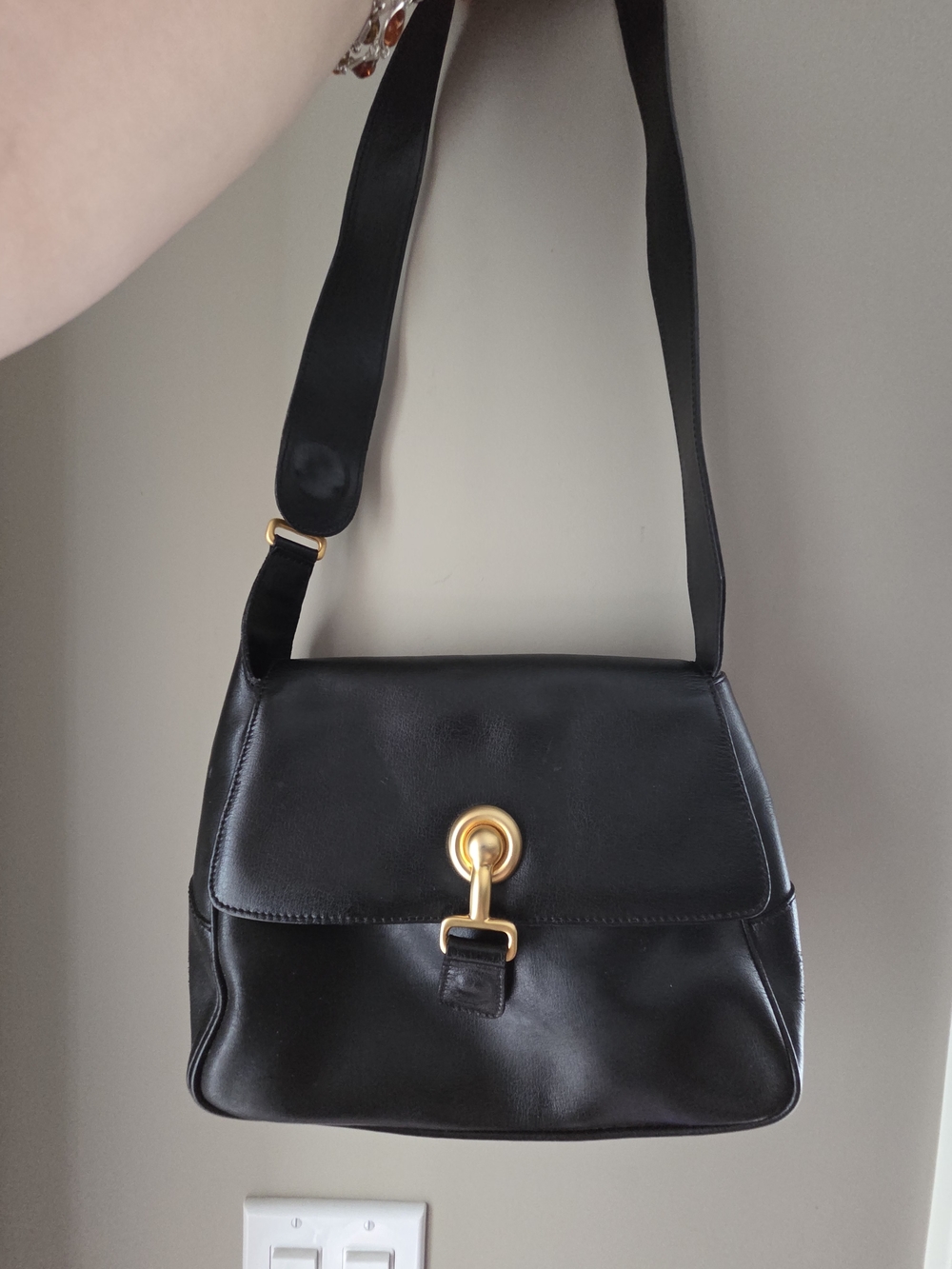 Classic Black Leather Shoulder Bag with Gold Accent
